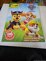 Front cover showing Paw Patrol characters, Crayola logo, 96 pages note