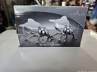 Front of retail box showing bee shakers image