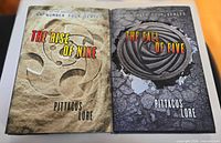 Both books side by side showing front dust jackets