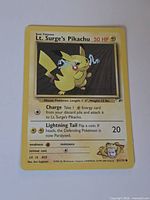 Front of Lt. Surge's Pikachu card showing artwork and details
