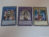 front view of the three Yu-Gi-Oh cards together