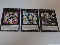 All three Yu-Gi-Oh Utopia XYZ cards side by side