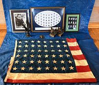 Full lot showing flag, eagle decor, three framed pieces