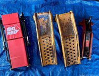 All four items laid out: jack, creeper, two ramps