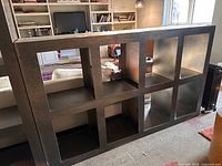 Front view showing eight square cubbies in one block