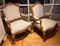 Full view of both armchairs showing frames and upholstery