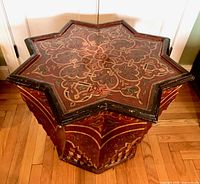 Full view of star-shaped hand-painted table