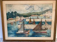 Full view of framed watercolour painting showing harbor scene