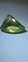 Triangular fancy cut lemon citrine side profile