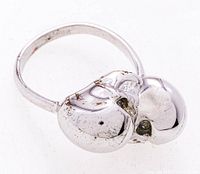 Top view showing both skull heads and overall ring form