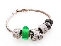 Full view of Pandora sterling bracelet with five charms