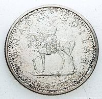 Reverse: mounted RCMP officer with dates 1873-1973