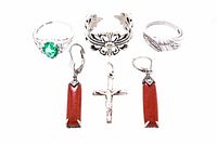 All five sterling silver jewellery pieces arranged together