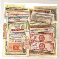 Top‐down view of entire spread of assorted banknotes