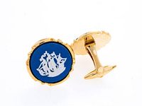 Pair of cufflinks front and side view showing blue jasperware ship motif and gold-tone backs