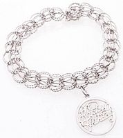 Sterling silver charm bracelet with round "Happy Birthday" script charm