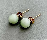 Pair of jade stud earrings front view
