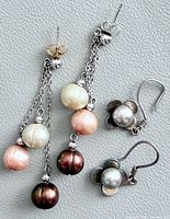 Both earring pairs front view showing pearl colours and styles