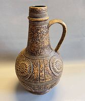 Front view of Fat Lava pitcher showing overall form and decoration