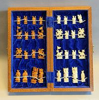 Open case showing full set of pieces secured in velvet