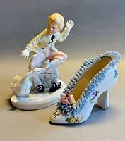 Front view of both figurines showing design details