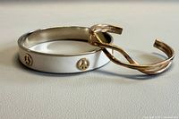 Both bracelets side by side, showing overall designs