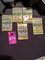 Front view of five sealed 1992 O-Pee-Chee Premier Hockey packs