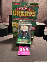 Front view of sealed Riddell Game Greats Dan Marino collectible in packaging