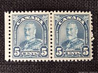 Front view of horizontal pair showing design, denomination and portrait