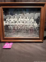 Full view of framed photograph showing team lineup