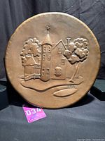 Full view of embossed copper plate