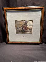 Front view of framed Luigi Moroni embossed print