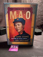Front cover of Mao: The Unknown Story hardcover with dust jacket and lot tag visible