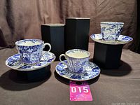 Three cups each on its saucer displayed