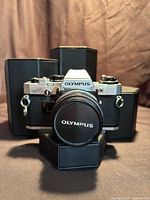 Front view Olympus OM10 with F.Zuiko lens attached