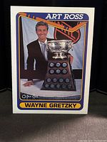 Front of Wayne Gretzky O-Pee-Chee card showing Art Ross trophy