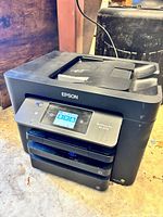 Front view of Epson WF-3733 showing control panel and paper trays