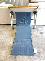 Front view of Fluidity barre unfolded with mat extended