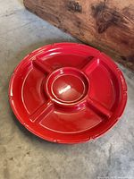 Top view of red glazed ceramic divided serving tray