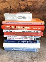 Stacked view of all ten books showing spines and titles