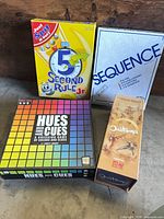 All four game boxes arranged together