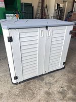 Front view showing double doors and overall appearance