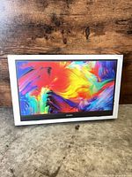 Front of retail box displaying colorful screen graphic