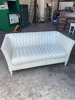 Front view of cream and beige wave pattern sofa