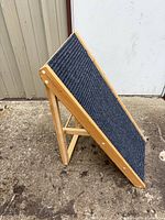 Ramp fully opened, carpeted surface visible