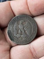 Reverse of 1856 10 centimes coin showing imperial eagle and denomination