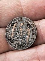 Reverse eagle, lettering EMPRE FRANCAIS, condition and hole shown