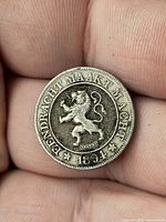 Obverse showing lion, motto, date