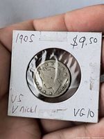 Obverse of 1905 Liberty Head V nickel in holder showing date and grade marking