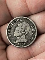Obverse showing bust, date 1908, legend REPUBLIQUE D'HAITI